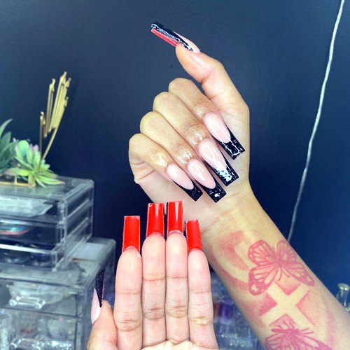 Long nails with red bottoms by Mya